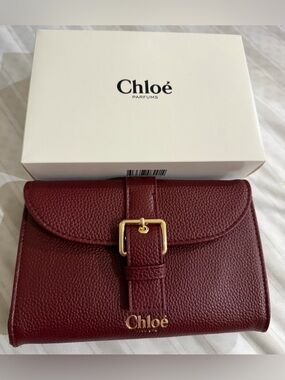 CHLOE Burgundy Pebbled Leather
Wallet with Gold Buckle